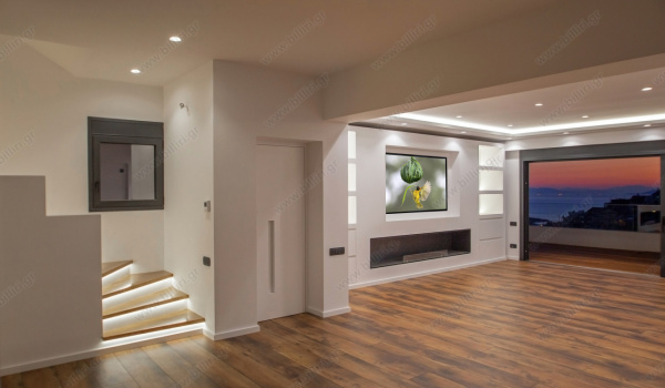 23_living_room_stairs_to_top_and_elevator_door_1376621970